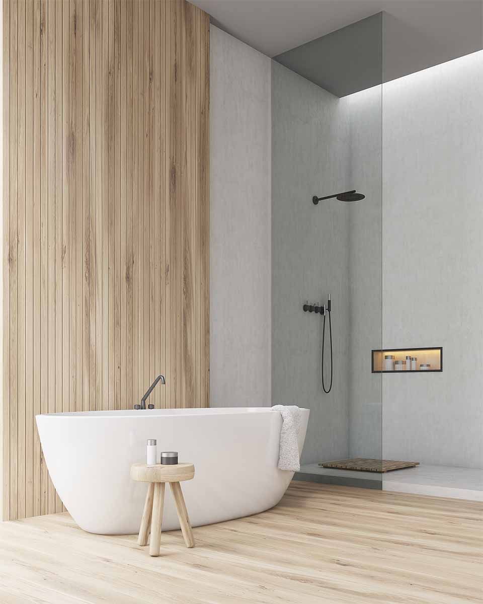 Corner of a bathroom with bathtub and a shower